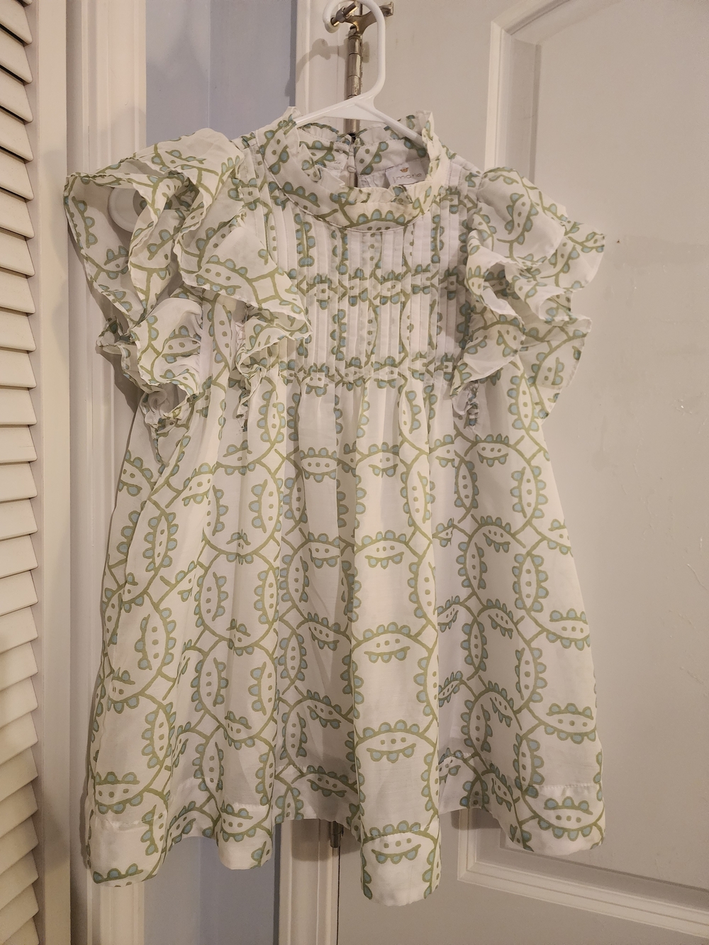 Ruffled White Blouse with Light Green Botanical Print